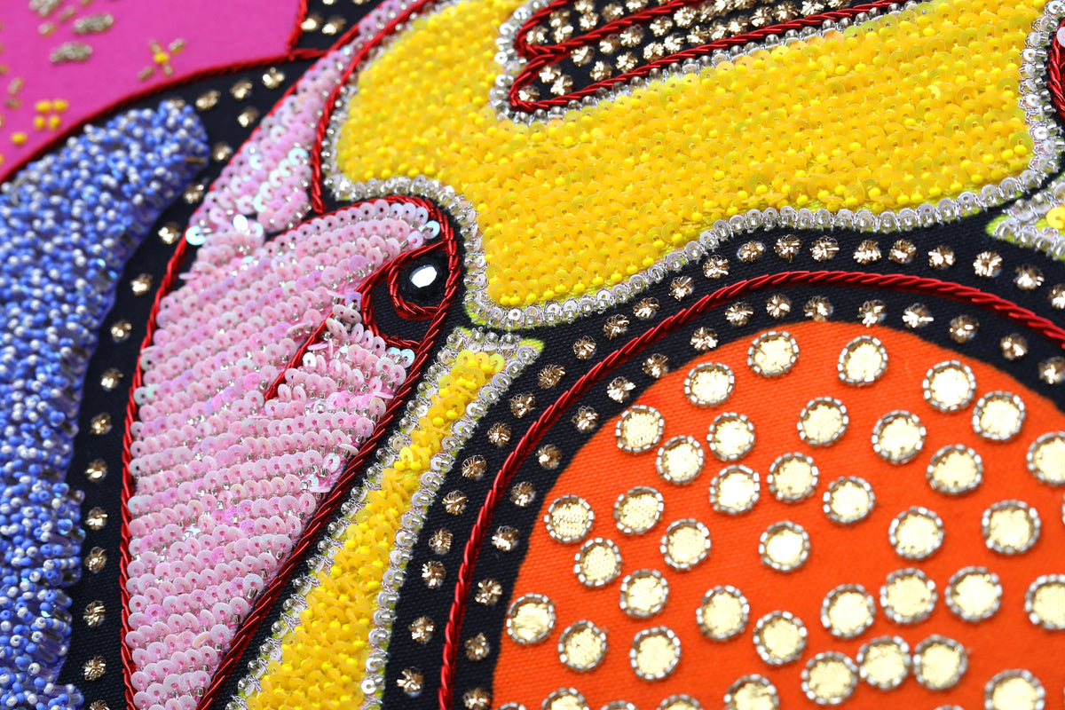 Sacred Offering (Black) detail: pink halo and gold threadwork
