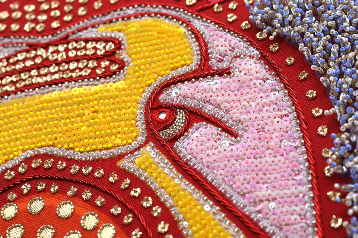Sacred Offering (Maroon) detail: sequinned petal and crystal setting