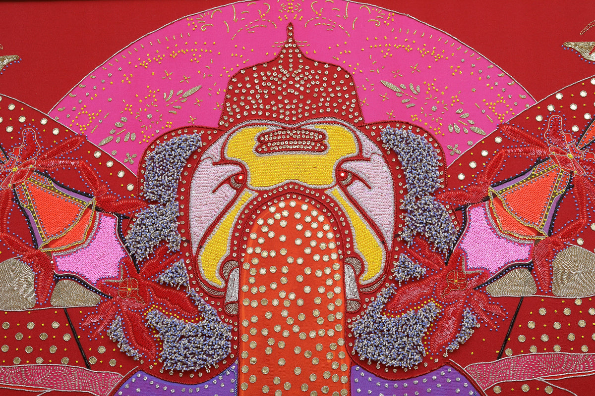 Sacred Offering (Maroon) detail: beadwork warming into the maroon ground